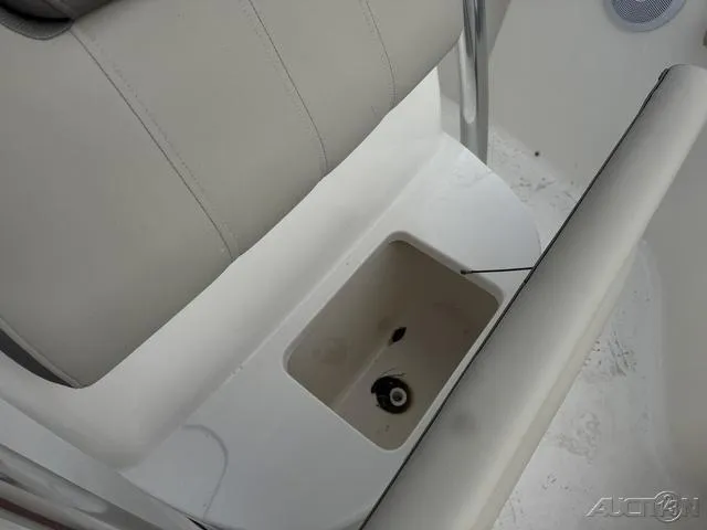 Slide: The Image of 2021 Key West 219fs boat seat with storage compartment. - 20