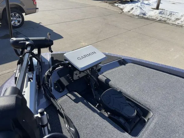 Slide: The Image of iKon VLX20 boat with Garmin navigation system, 2025 model, parked on a snowy driveway. - 10