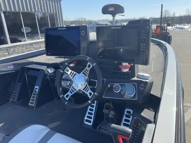 Slide: The Image of 2018 Ranger Z520L boat cockpit with dual monitors and modern steering wheel. - 6