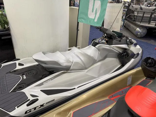 Slide: The Image of 2025 Sea-Doo Waverunner GTX, sleek design, displayed indoors. - 3
