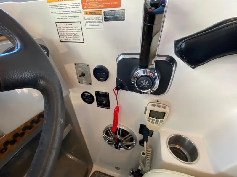 Slide: The Image of Control panel of a 2008 Rinker 280 Express Cruiser boat. - 11