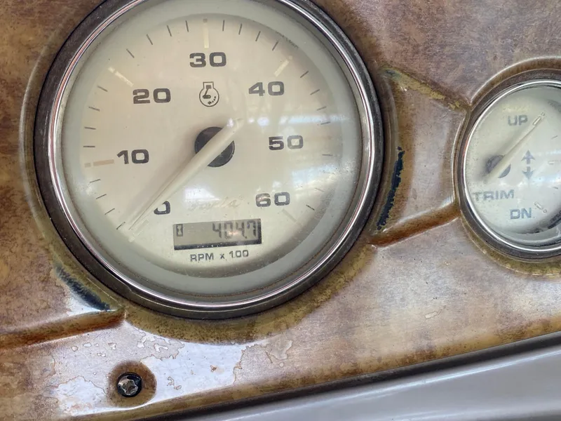 Slide: The Image of Close-up of 2008 Rinker 280 Express Cruiser tachometer showing 404.7 RPM x 100. - 45