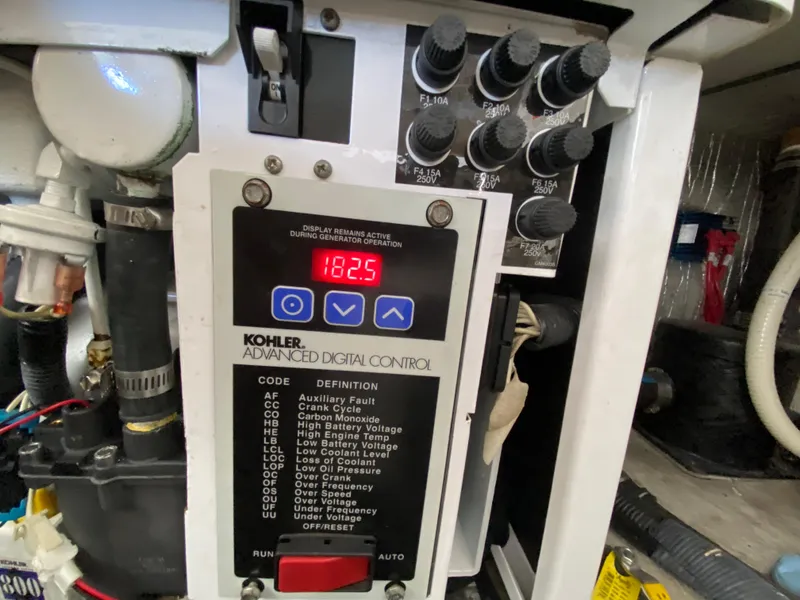 Slide: The Image of Kohler advanced digital control panel on 2008 Rinker 280 Express Cruiser. - 46