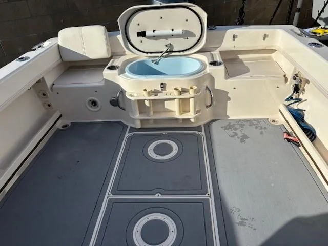 Slide: The Image of 2018 Grady-White 228 SEAFARER boat interior with open storage and seating. - 16