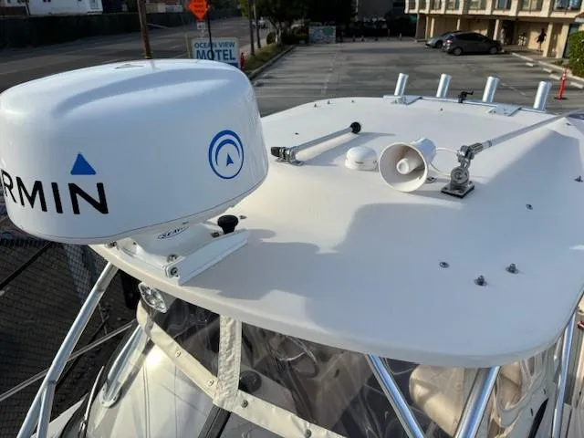 Slide: The Image of 2018 Grady-White 228 Seafarer boat with Garmin radar on top. - 22