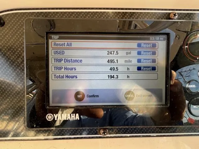 Slide: The Image of Yamaha display on 2018 Grady-White 228 Seafarer showing trip data and fuel usage. - 28