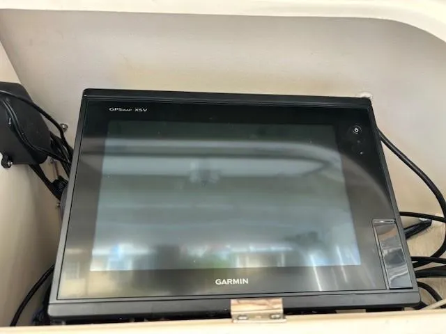 Slide: The Image of Garmin GPS device on 2018 Grady-White 228 Seafarer boat dashboard. - 31
