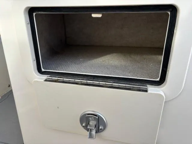 Slide: The Image of Storage compartment on a 2018 Grady-White 228 Seafarer boat. - 35