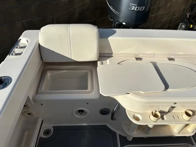 Slide: The Image of 2018 Grady-White 228 Seafarer boat interior with seating and storage compartments. - 40