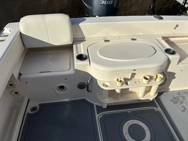 Slide: The Image of 2018 Grady-White 228 Seafarer boat interior with seating and storage compartments. - 41