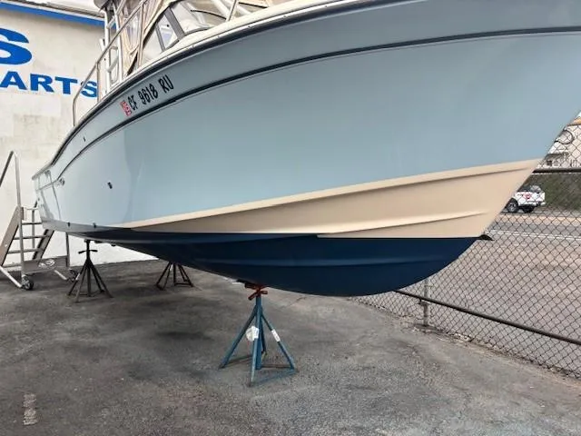 Slide: The Image of 2018 Grady-White 228 Seafarer boat on stands, side view. - 47
