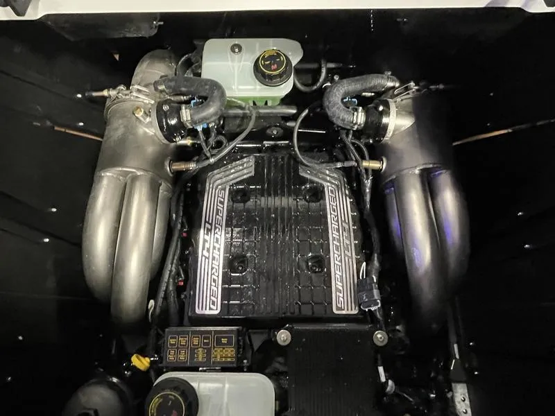 Slide: The Image of 2025 Malibu 26 LSV engine with supercharger, showcasing advanced marine engineering. - 29