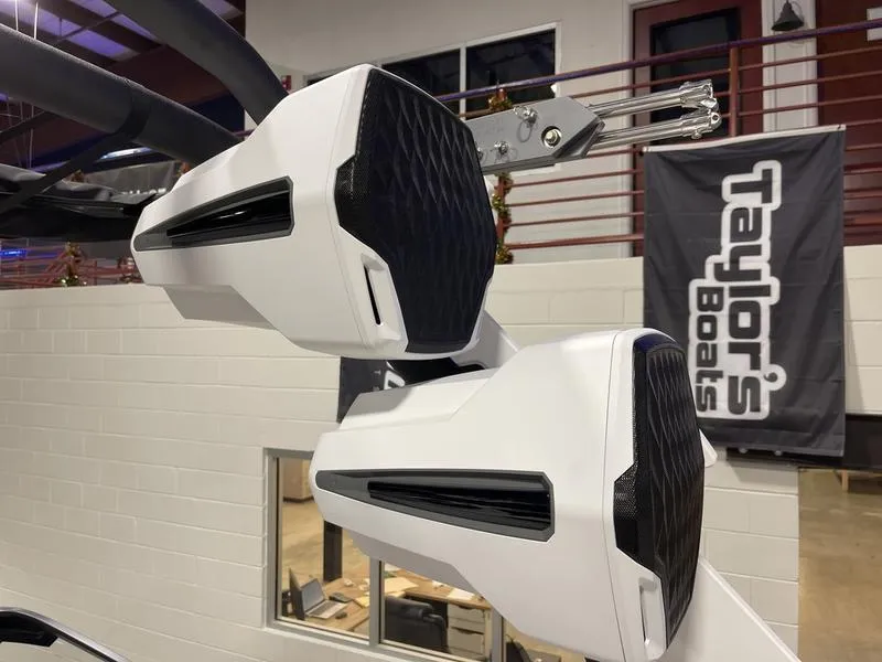 Slide: The Image of 2025 Malibu 26 LSV boat speakers at Taylor's Boats showroom. - 31