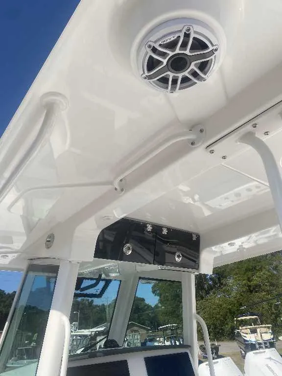 Slide: The Image of 2025 Caymas 34 CT boat interior with speaker and control panel. - 10