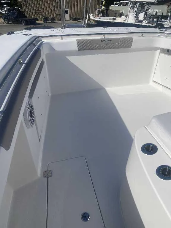 Slide: The Image of 2025 Caymas 34 CT boat interior with sleek white design and modern features. - 4