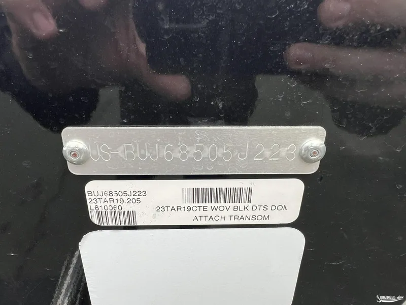Slide: The Image of 2023 Tracker V-19 boat identification plate with serial number and barcode. - 13