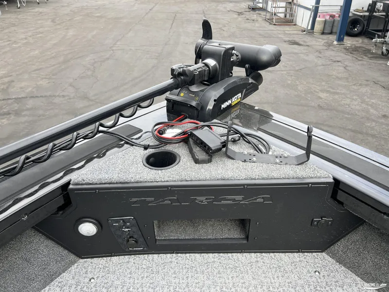 Slide: The Image of 2023 Tracker V-19 boat with Minn Kota trolling motor on deck. - 9