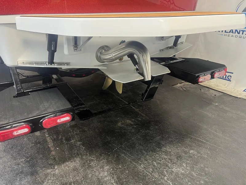 Slide: The Image of 2025 Moomba Max boat rear view showing propeller and exhaust system. - 9