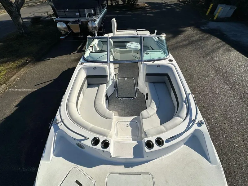 Slide: The Image of 2022 Hurricane SunDeck 187 IO boat interior with spacious seating and modern design. - 5