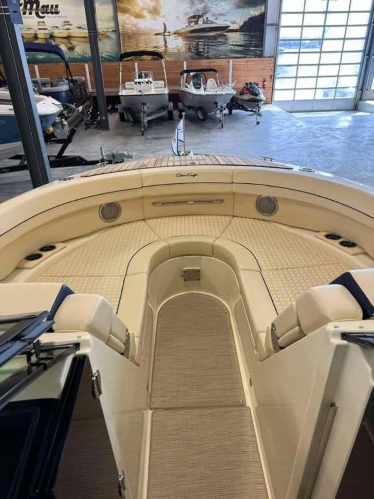 Slide: The Image of 2025 Chris-Craft Launch 31 GT boat interior, featuring elegant seating and spacious design. - 2
