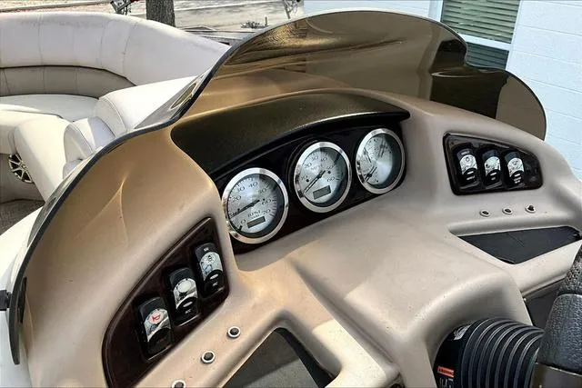 Slide: The Image of Dashboard of a 2014 Bennington 2375 GCW boat with gauges and controls. - 12