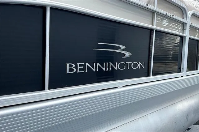 Slide: The Image of 2014 Bennington 2375 GCW pontoon boat side view with logo. - 17
