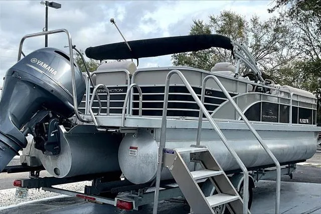 Slide: The Image of 2014 Bennington 2375 GCW pontoon boat with Yamaha motor on trailer. - 5