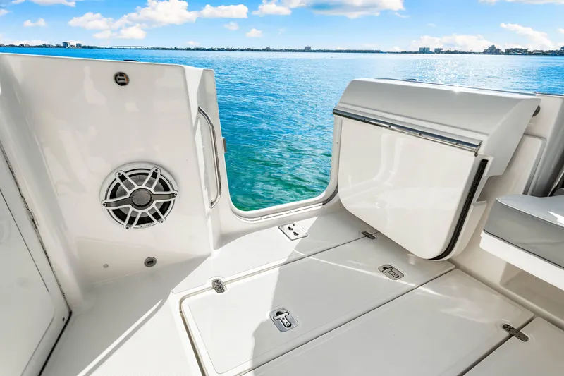 Slide: The Image of 2021 Pursuit DC 365 Dual Console boat interior with ocean view. - 25