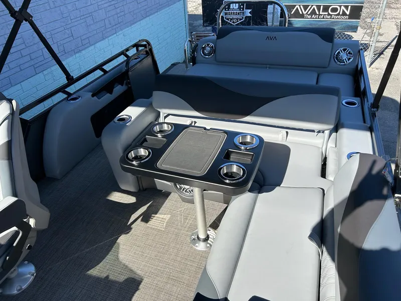 Slide: The Image of 2025 Avalon 2385 LSZ VRL pontoon boat interior with seating and table. - 7
