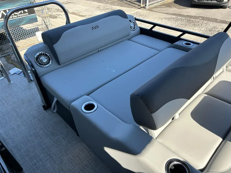 Slide: The Image of 2025 Avalon 2385 LSZ VRL boat interior with gray seating and cup holders. - 8
