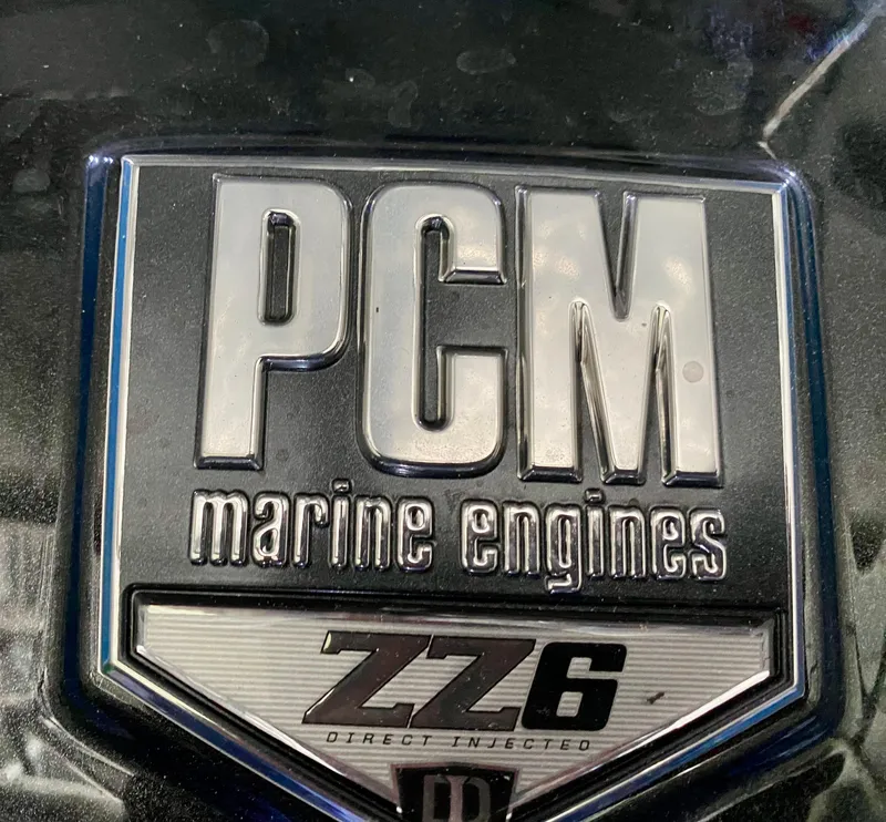 Slide: The Image of PCM Marine Engines ZZ6 badge on 2022 Montara 25 SURF BOSS 2.0. - 20