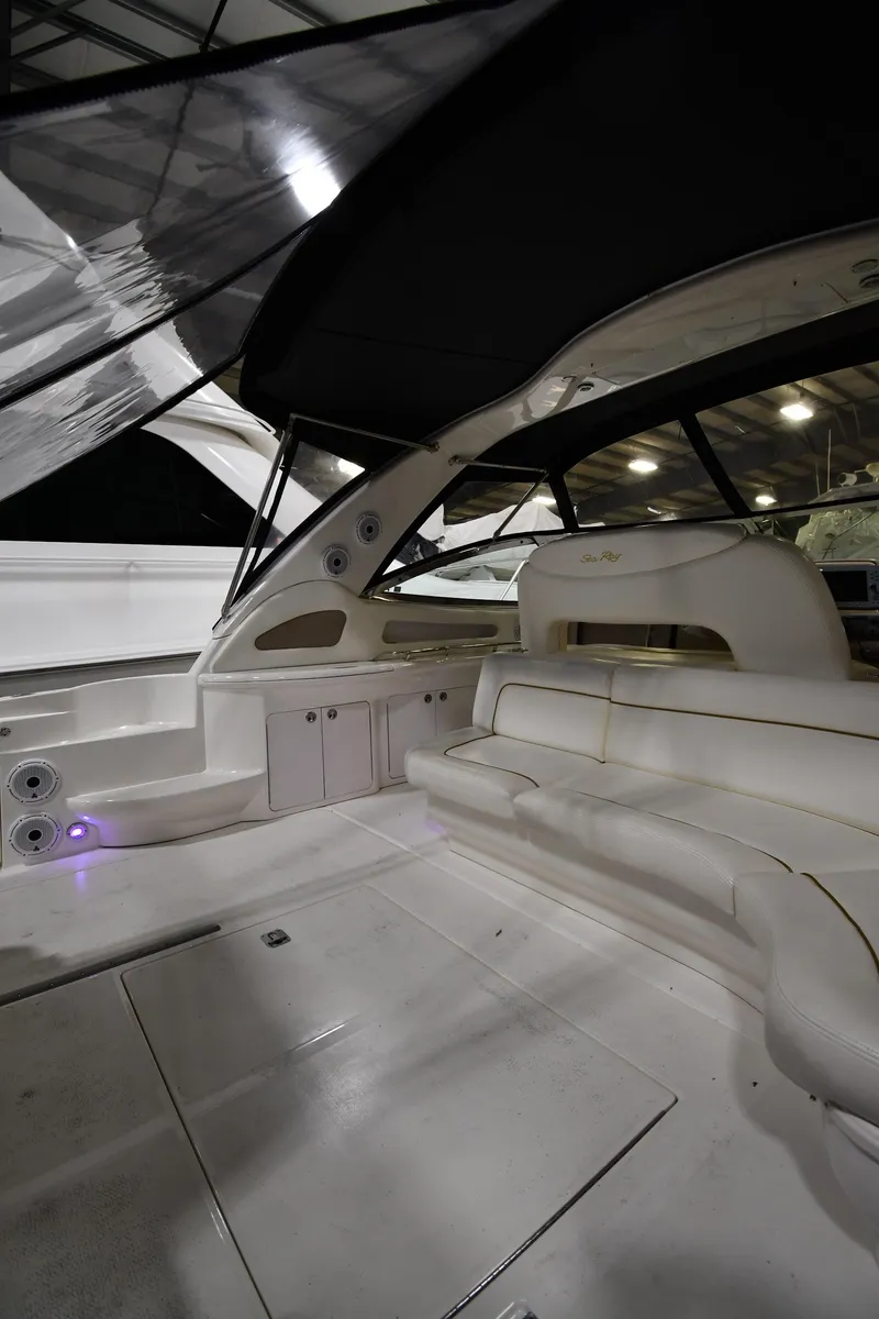 Slide: The Image of 2000 Sea Ray 460 Sundancer yacht interior with spacious seating and modern design. - 11