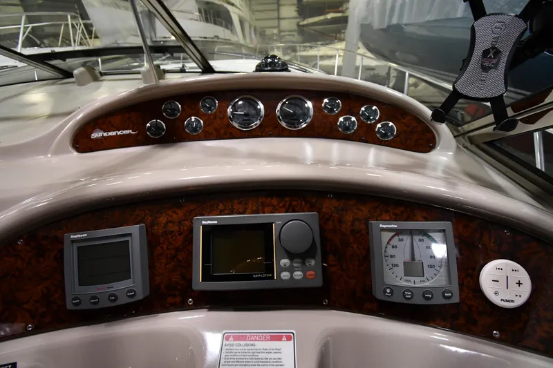 Slide: The Image of Dashboard of a 2000 Sea Ray 460 Sundancer boat with navigation instruments. - 17