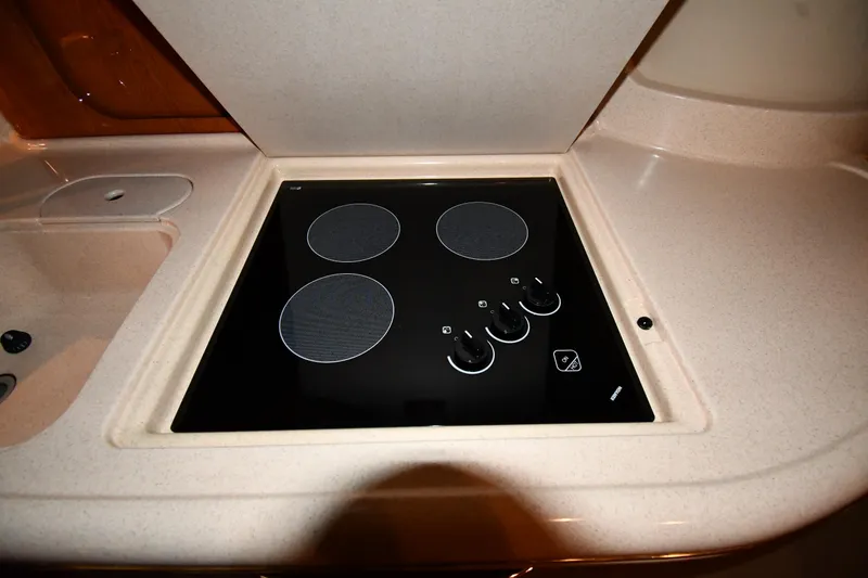 Slide: The Image of Stovetop in 2000 Sea Ray 460 Sundancer yacht kitchen area. - 46