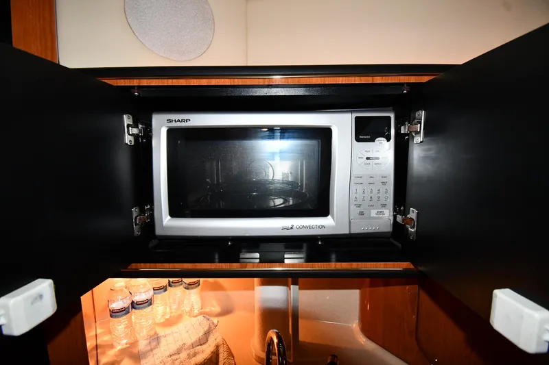 Slide: The Image of Microwave in 2000 Sea Ray 460 Sundancer yacht kitchen cabinet. - 47
