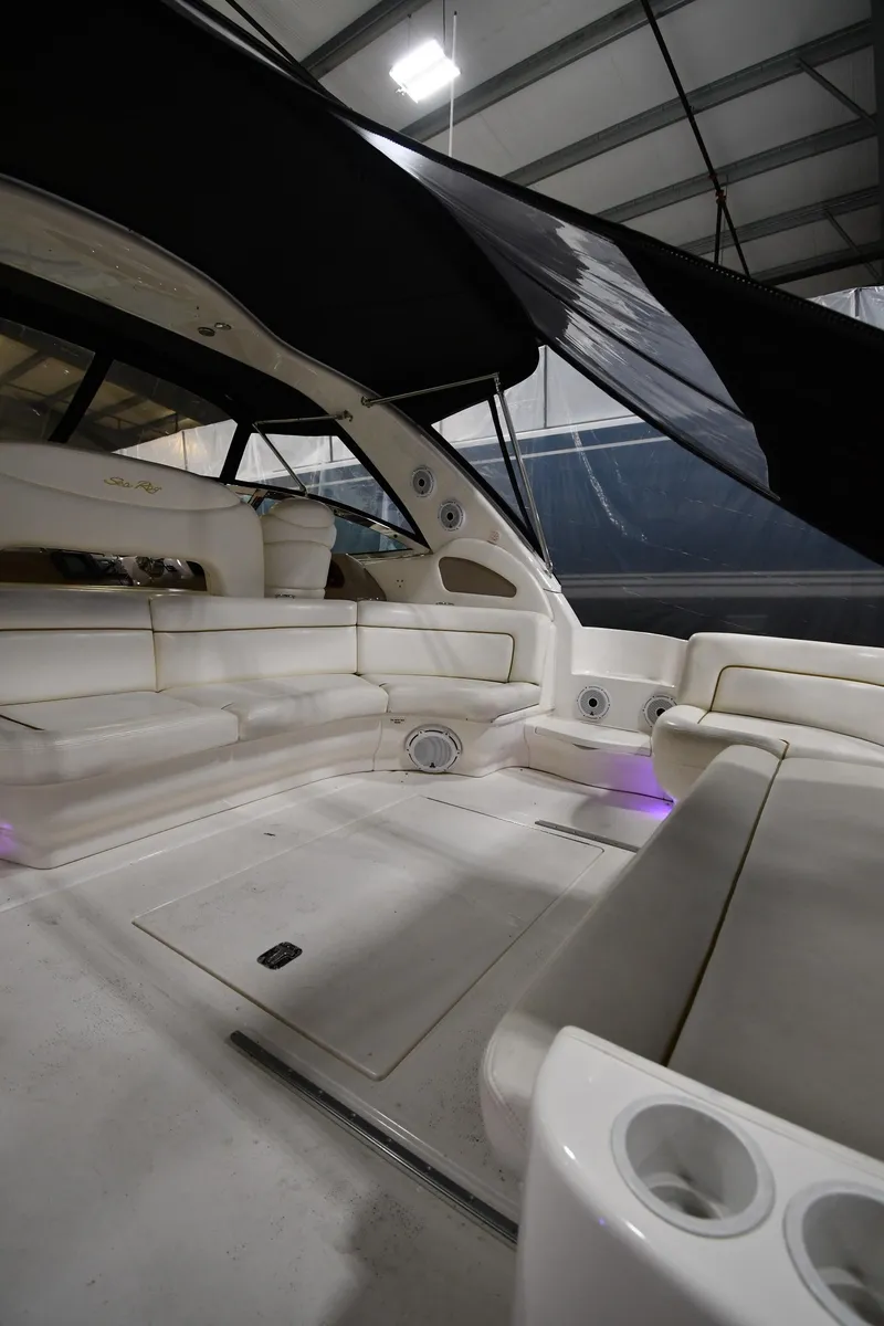 Slide: The Image of Interior of 2000 Sea Ray 460 Sundancer yacht with spacious seating area. - 9