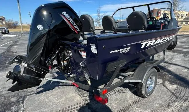 Slide: The Image of 2025 Tracker Pro Guide V-16 WT boat with Mercury engine on trailer. - 5