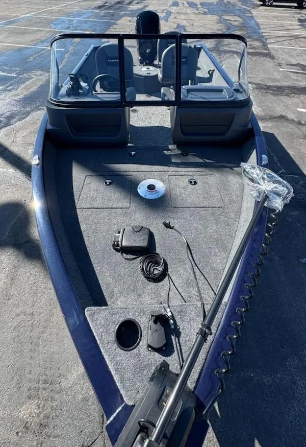 Slide: The Image of 2025 Tracker Pro Guide V-16 WT fishing boat with spacious deck and modern equipment. - 6