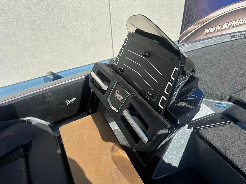 Slide: The Image of 2025 Ranger Z520 boat dashboard with modern controls and sleek design. - 15