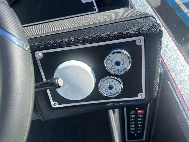 Slide: The Image of Dashboard of 2025 Ranger Z520 boat with gauges and controls. - 20