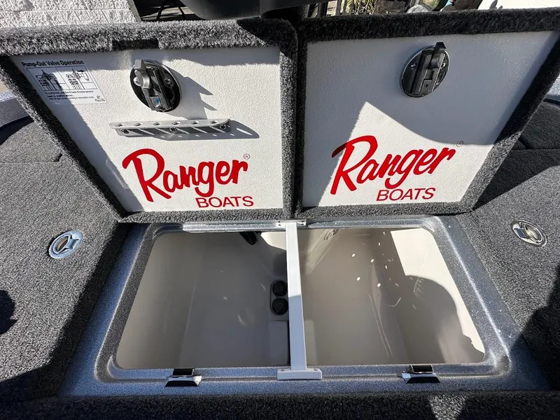 Slide: The Image of 2025 Ranger Z520 boat storage compartments with Ranger Boats logo. - 32