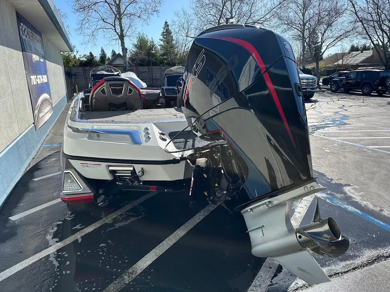 Slide: The Image of 2025 Ranger Z521 boat control panel with throttle and switch panel. - 10