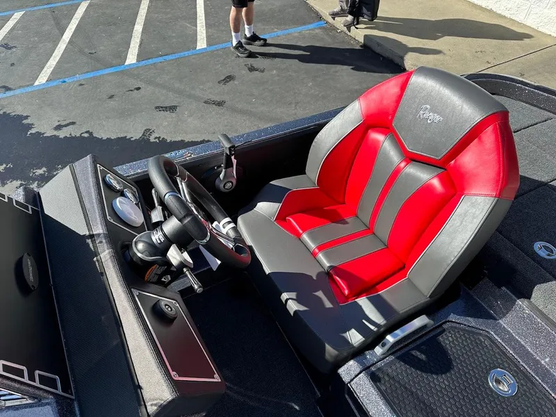 Slide: The Image of 2025 Ranger Z521 boat storage compartments with open lids, showcasing interior space. - 18