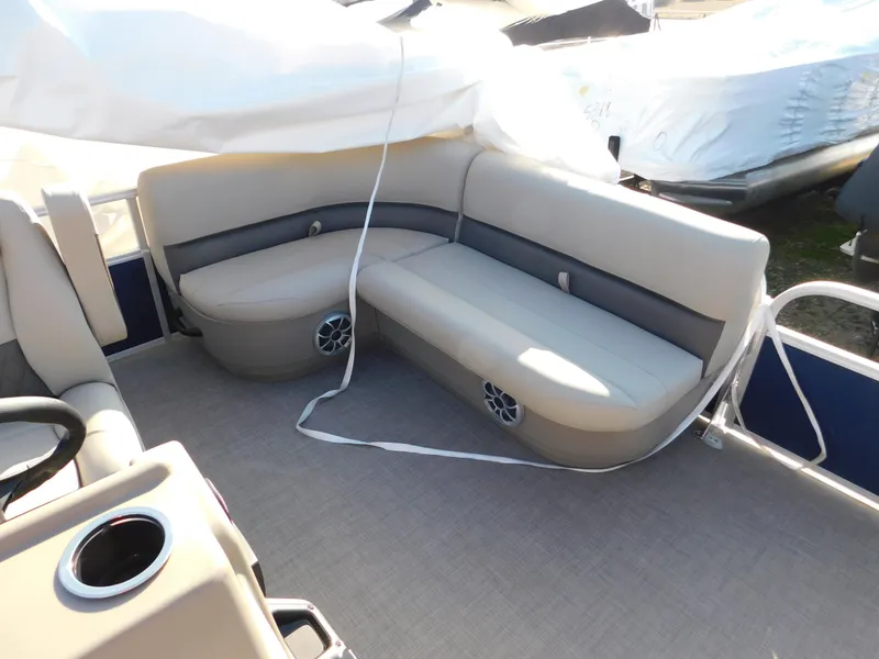 Slide: The Image of 2025 Sun Tracker Bass Buggy 16 XL Select pontoon boat interior seating area. - 17