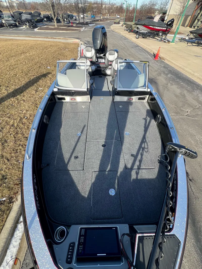 Slide: The Image of 2024 Ranger 622FS Pro fishing boat with spacious deck and modern controls. - 10