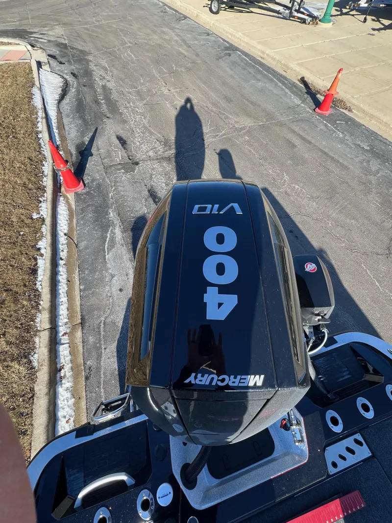 Slide: The Image of 2024 Ranger 622FS Pro with Mercury 400 V10 engine, parked on a paved surface. - 3