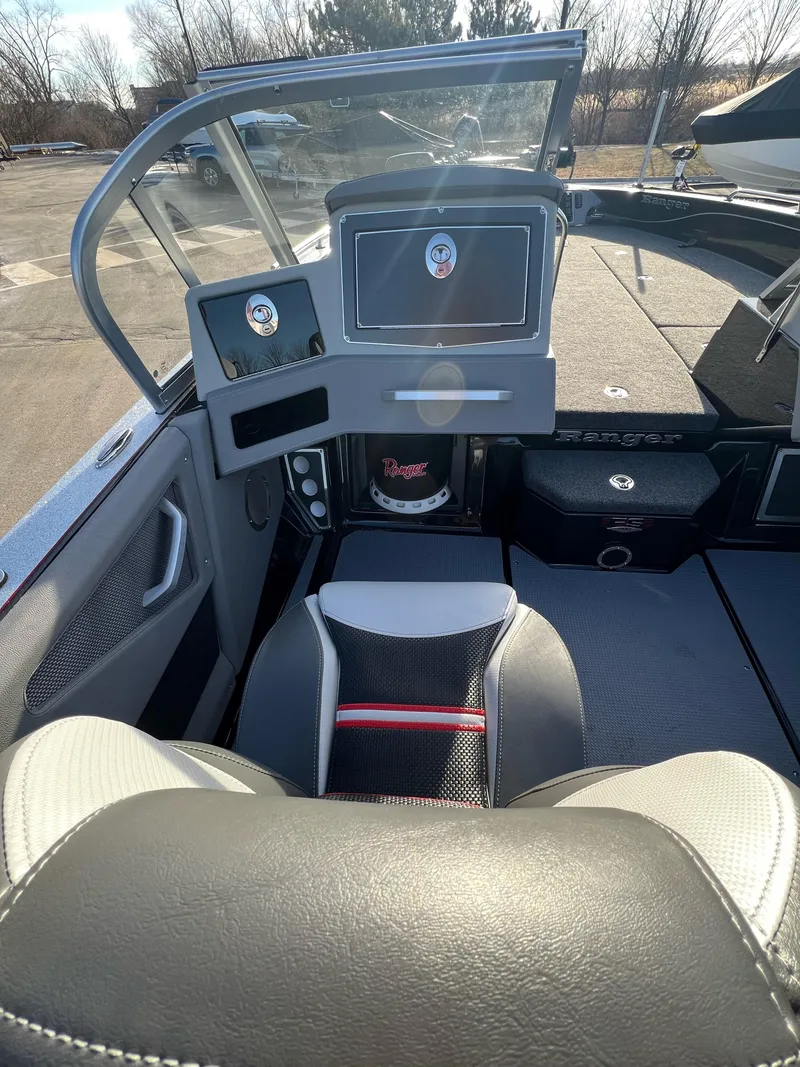Slide: The Image of 2024 Ranger 622FS Pro boat interior with modern dashboard and seating. - 5