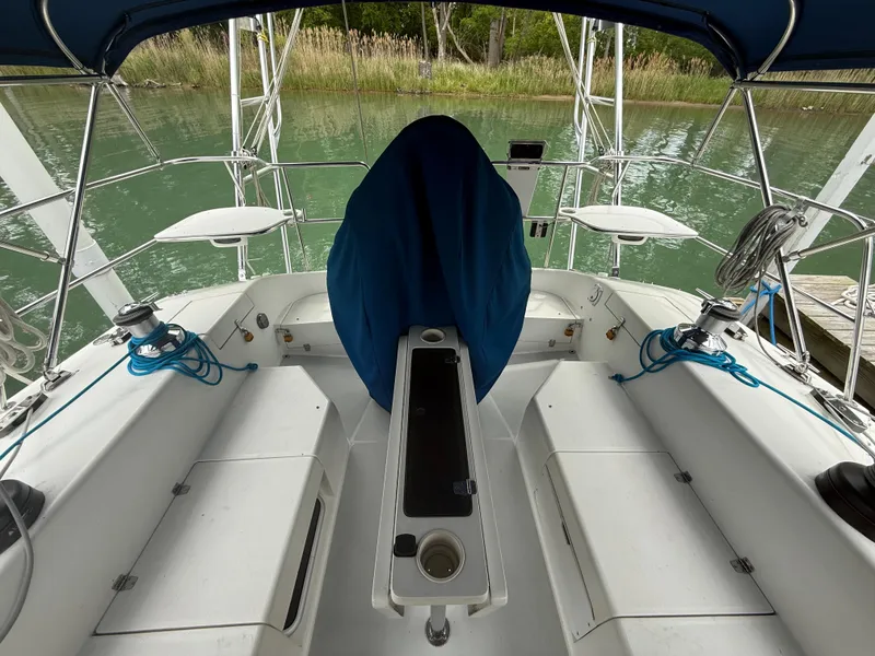 Slide: The Image of Cockpit of 2001 Catalina 42 MkII sailboat with blue cover and seating. - 12
