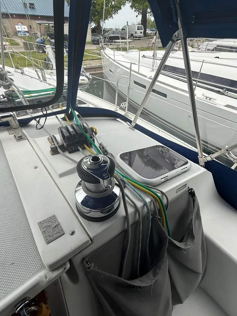 Slide: The Image of 2001 Catalina 42 MkII sailboat cockpit with winch and ropes. - 15