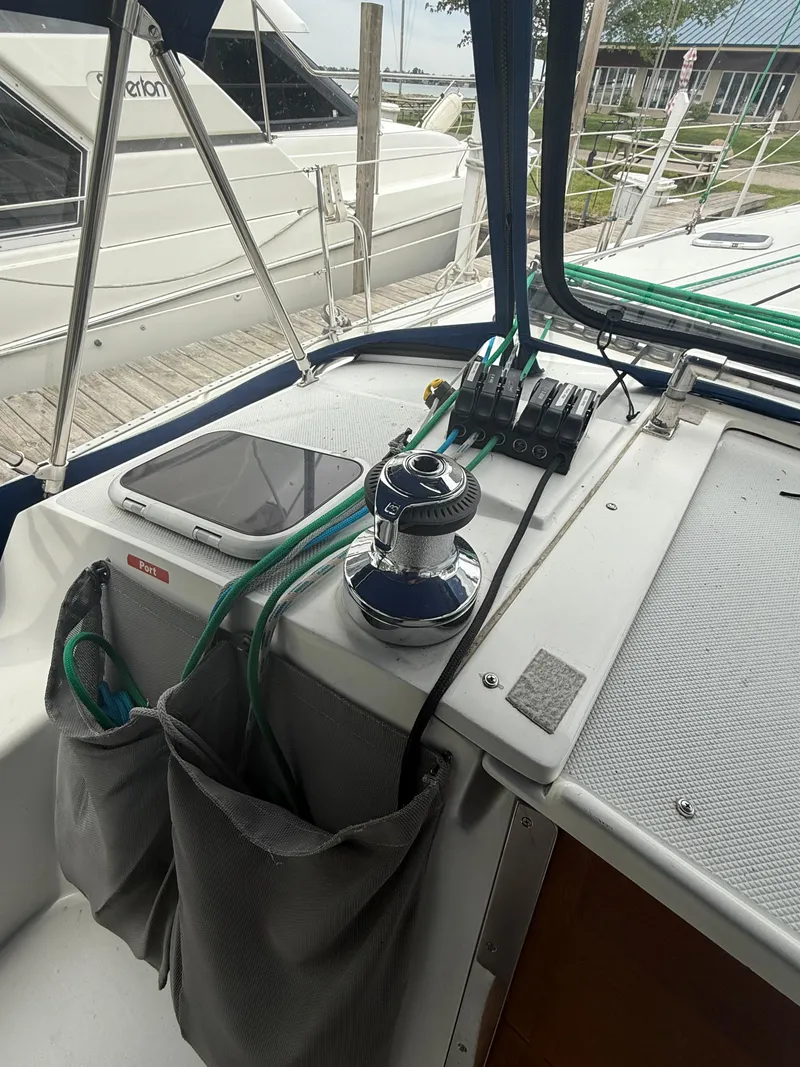 Slide: The Image of Cockpit of 2001 Catalina 42 MkII sailboat with winch and ropes. - 16